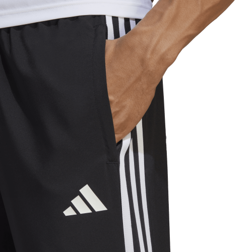 Vycházkové kalhoty adidas Tiro 23 League Woven