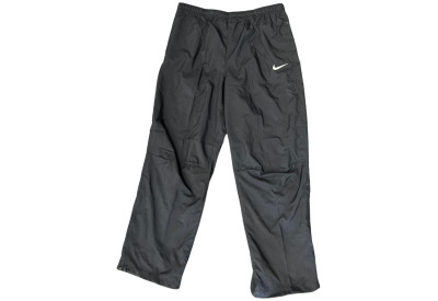 Šusťákové kalhoty Nike